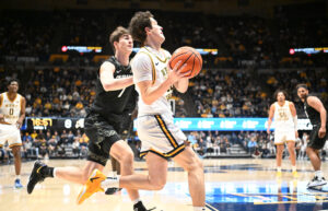 WVU men's basketball holds on to beat Colorado, remaining perfect at home